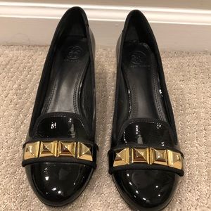 Tory Burch patent leather pumps with gold accents